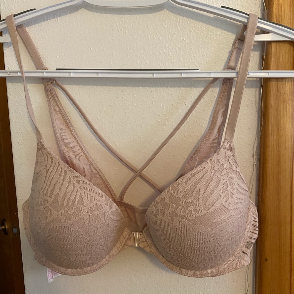 Pink Victoria’s Secret Push Up Bra (front clasp)